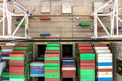 Dollar, stocks hit and gold hits record as trade war panic returns