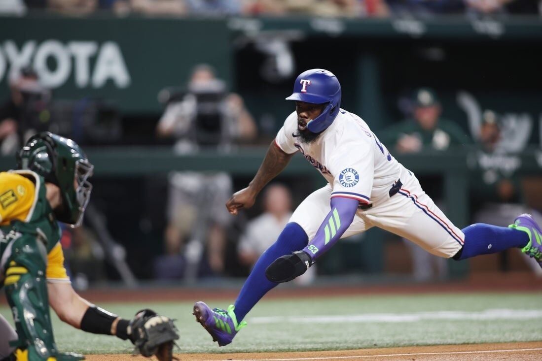 Rangers’ bats break out in 15-2 rout of Athletics
