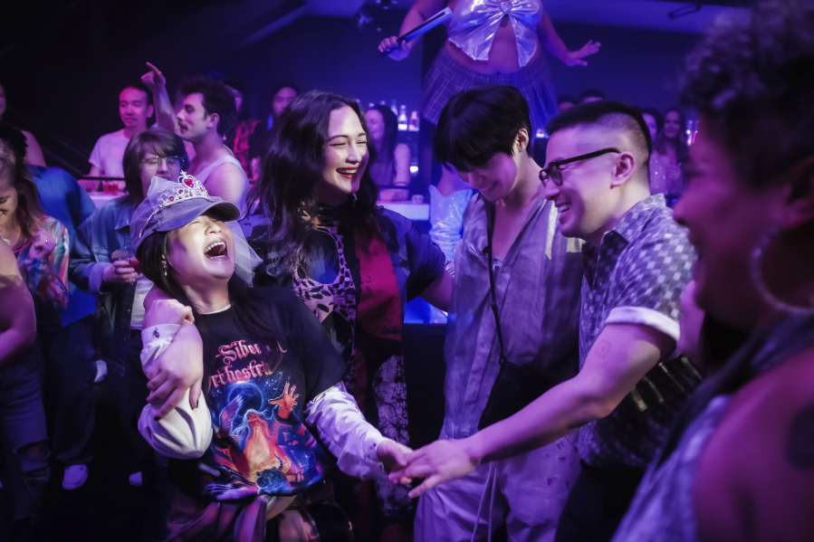 Movie review: ‘The Wedding Banquet’ an affable update of ‘90s rom-com
