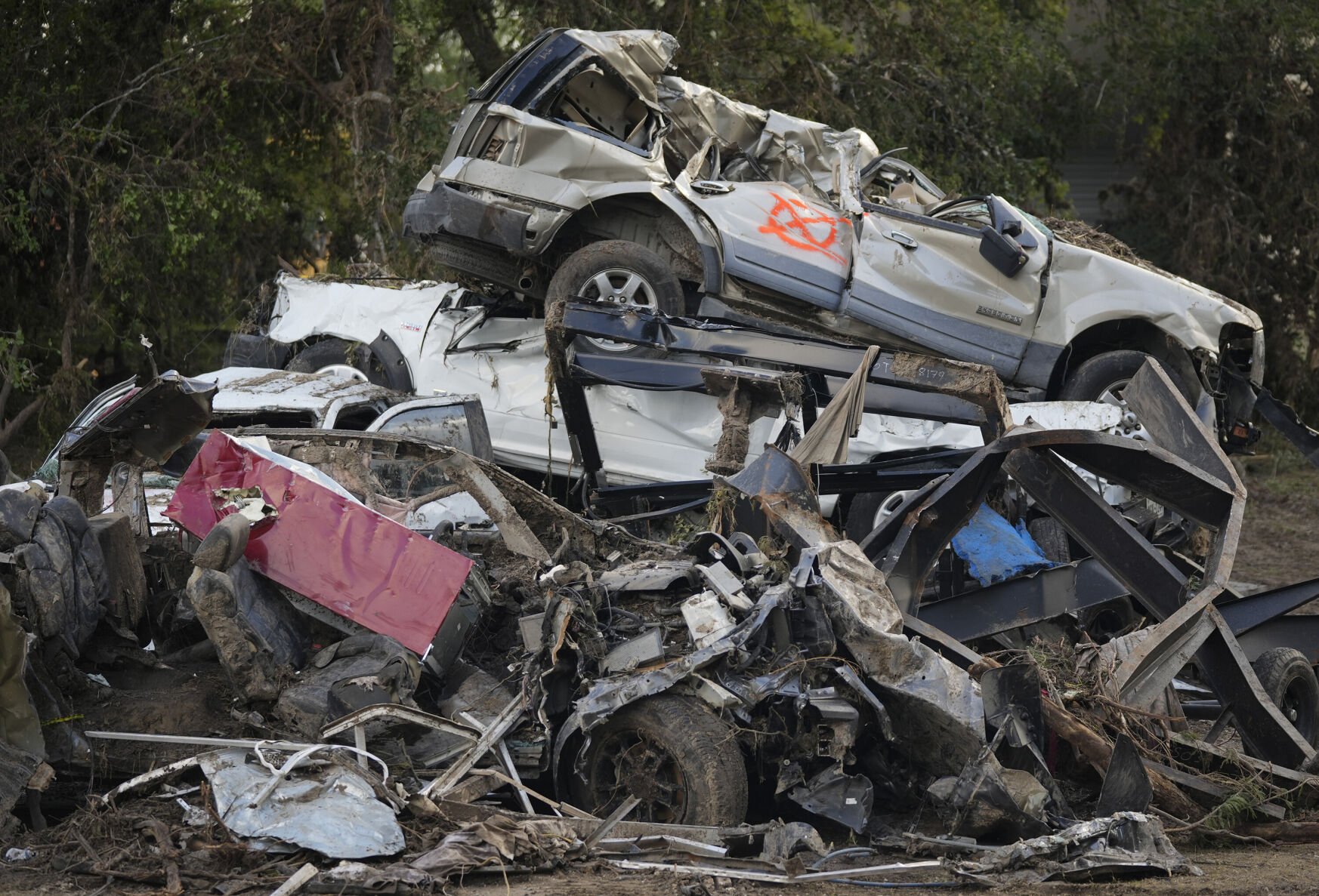 Texas governor says 161 people missing as crews scour flood zone