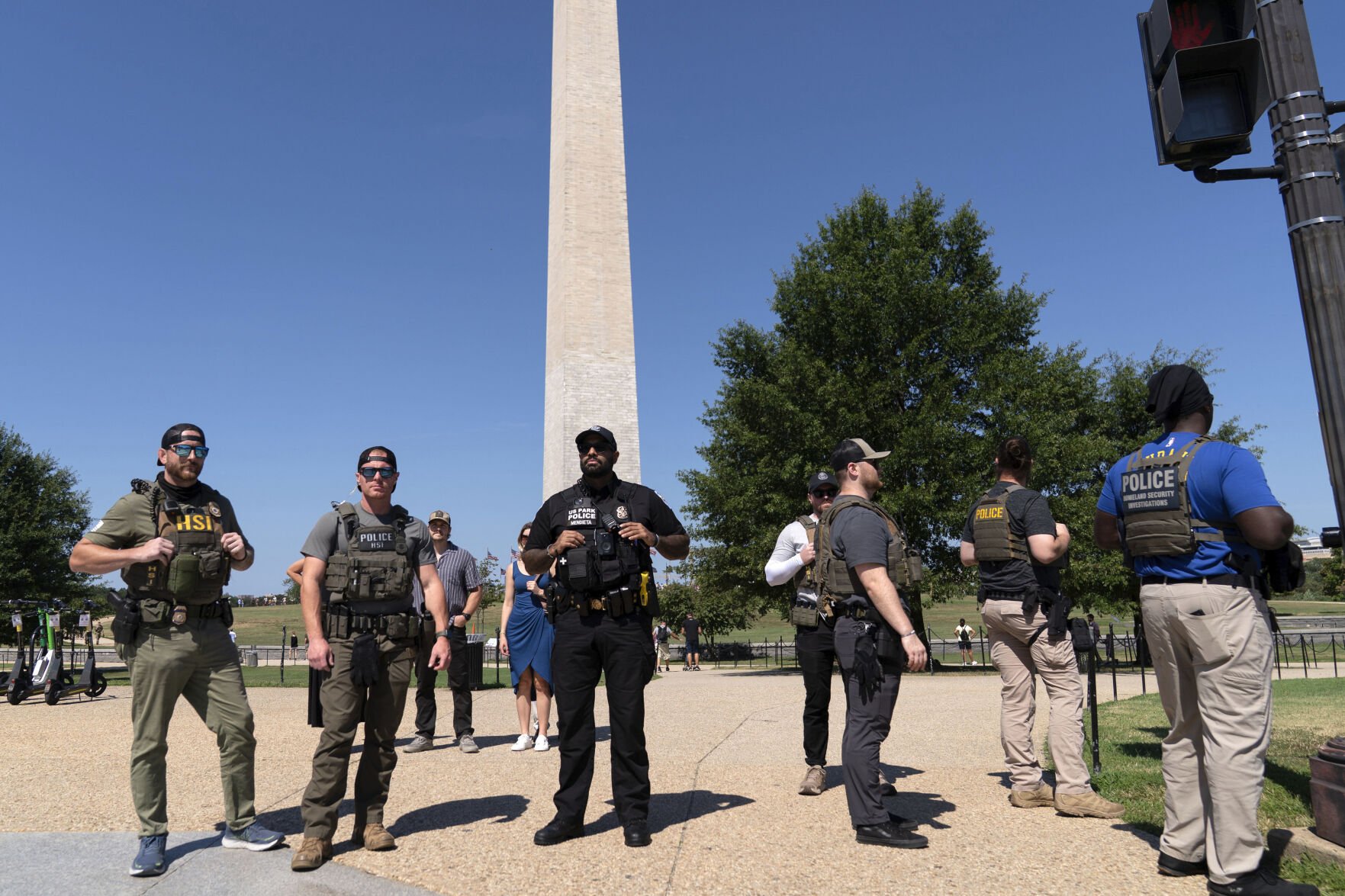 Some Guard units in Washington are now carrying firearms, Pentagon says. Trump targets more cities