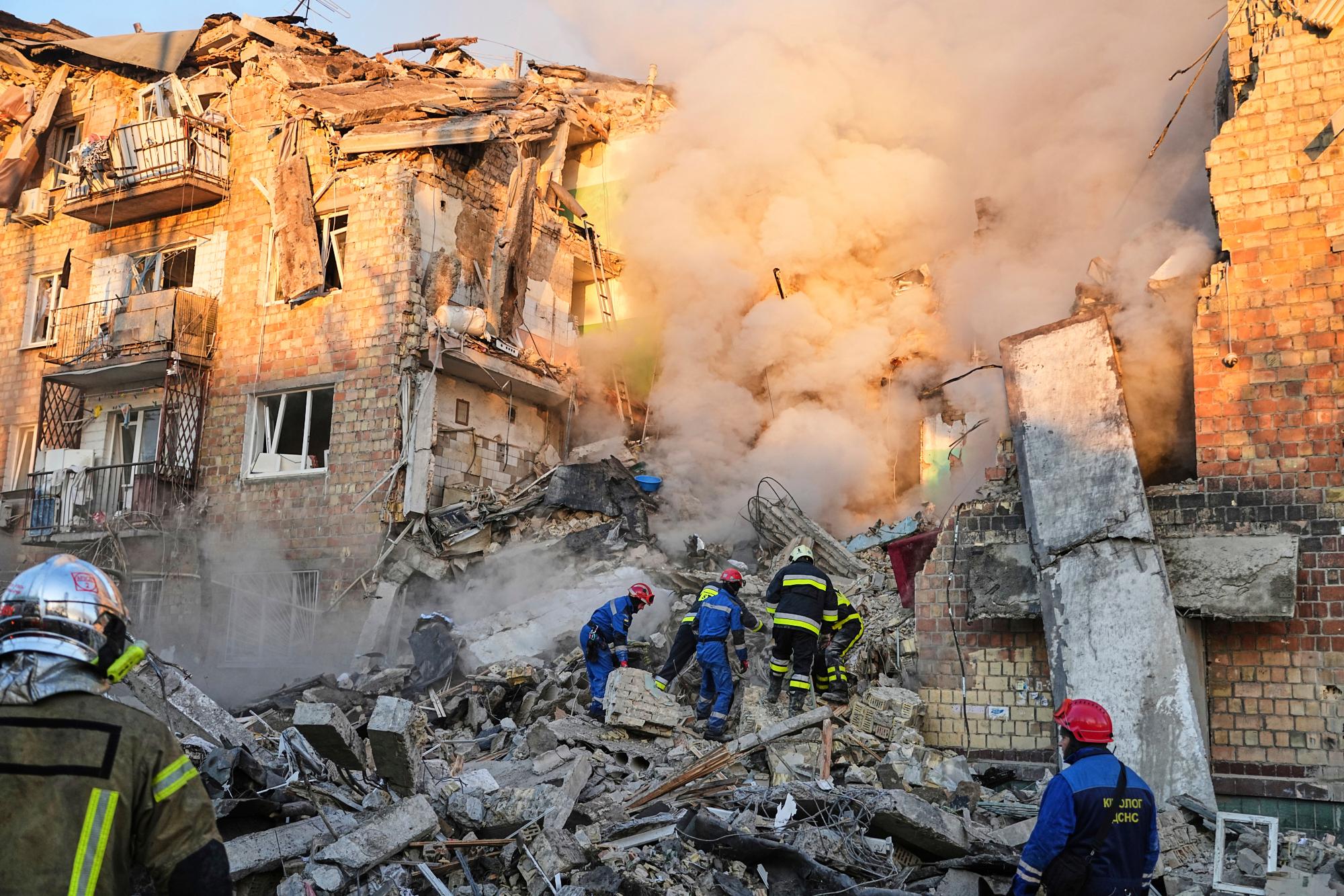 Peace efforts in limbo as Ukraine’s capital mourns 23 dead after Russian attack