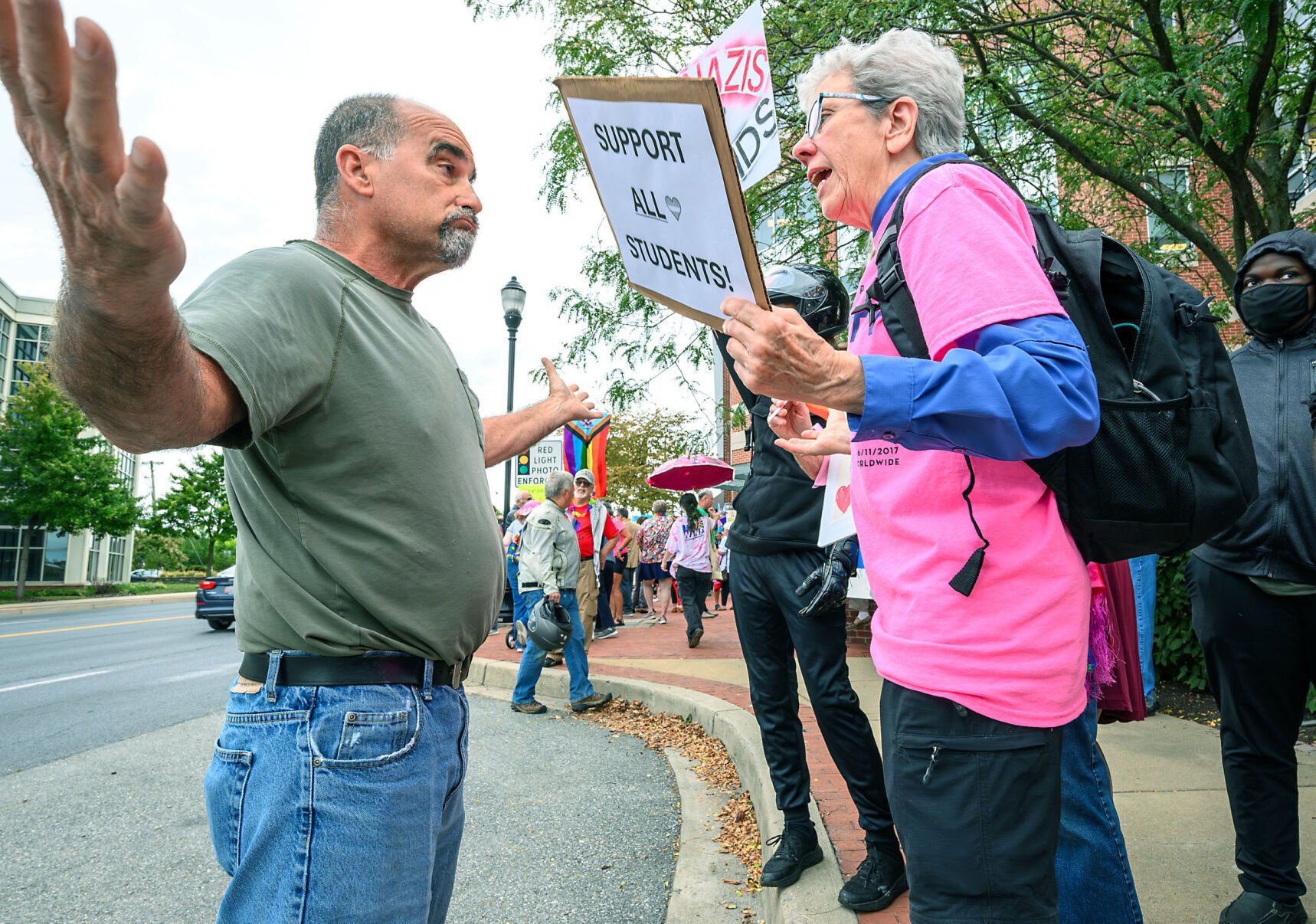 Dueling protests held outside school board meeting over gender identity, other issues